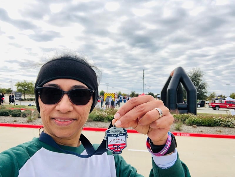 Showing off event medal